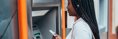 Woman using an ATM