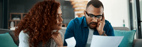 Couple looking at budget