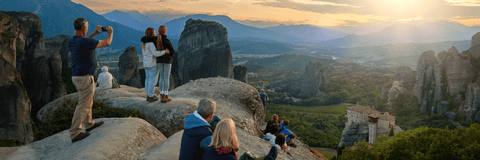 group of tourists on cliff