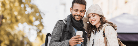 Couple looking at phone