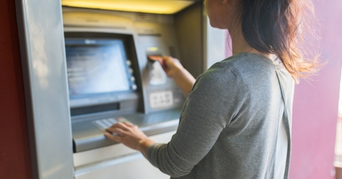 woman using ATM