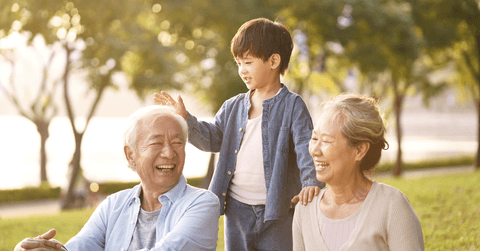 Happy grandparents with grandchild