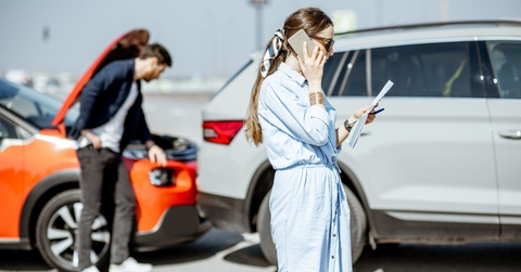 Woman calling road assistance 