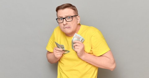 man holding money in hands