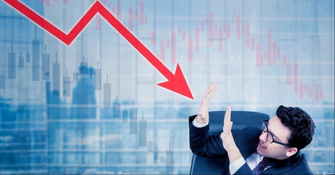 scared man attacked by declining arrow in office