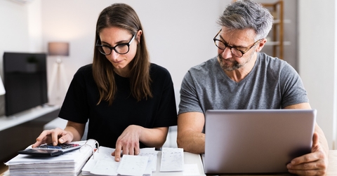 couple doing taxes and family budget