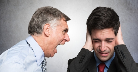 angry businessman shouting to an employee