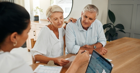 financial advisor consultation with clients on retirement