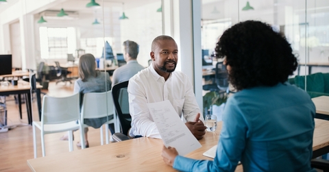  job applicant answering questions during an office interview