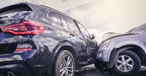 two suv cars crashed into each other on road in fatal accident