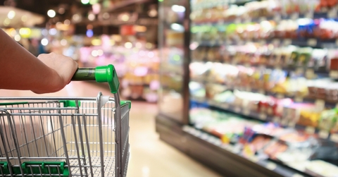 woman hand hold supermarket shopping cart