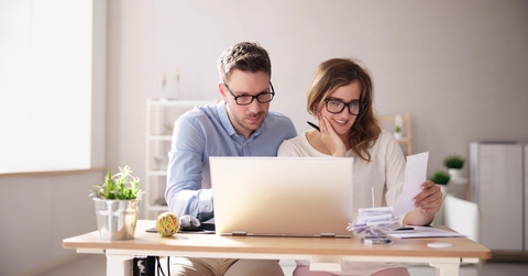 couple doing taxes and family budget