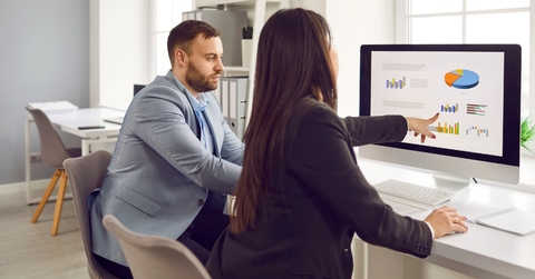 business people discussing data at work