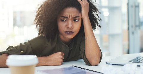 Stressed woman at work