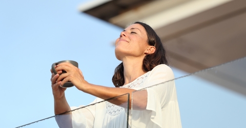 Adult woman with coffee cup