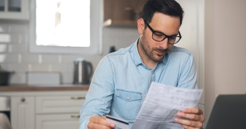 man thinking to pay utility bills