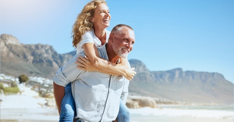 mature couple enjoying beach vacation