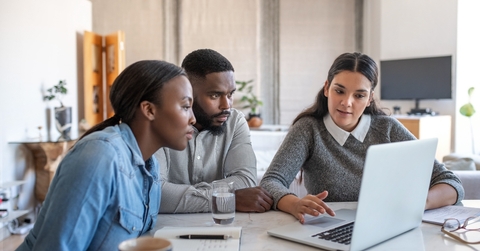couple listening to their financial planner