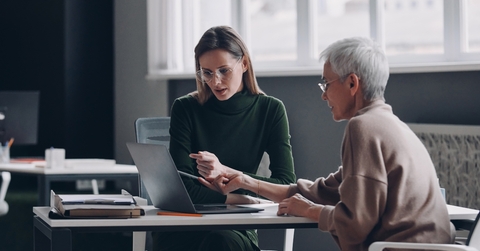 confident financial advisor discussing options