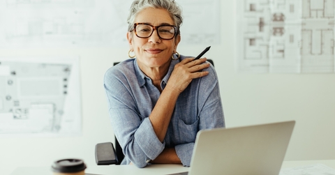confident senior businesswoman posing at work