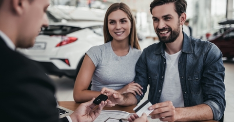 Couple buying a car
