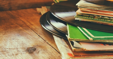 vintage record stake on wooden table