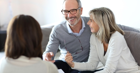 senior couple meeting financial adviser