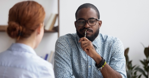 african american boss interviewing female candidate