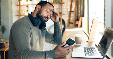 african freelancer with headache