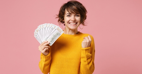 hold fan of cash money