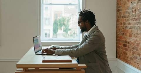 african american businessman using laptop