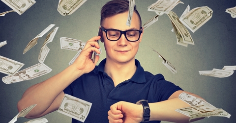 businessman looking at wrist watch