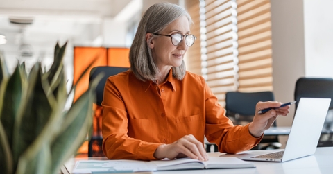 senior business woman working on laptop