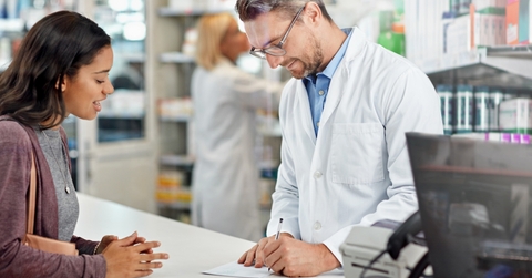 pharmacist writing prescription