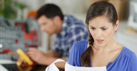 women looking at expensive bill