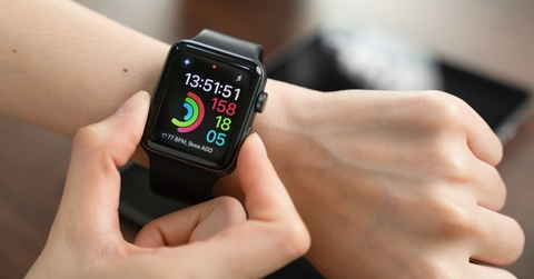 woman touching apple watch