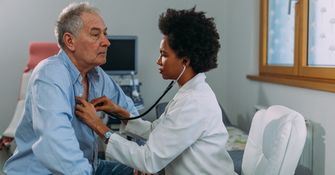 female doctor examining a patient