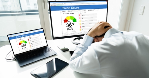 man frustrated at Poor Credit Score
