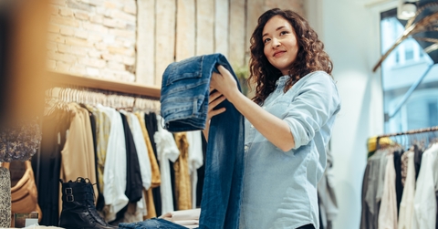 woman shopping in clothing store