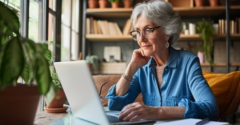 mature woman working on laptop