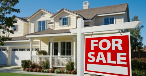 home for sale sign outdoors