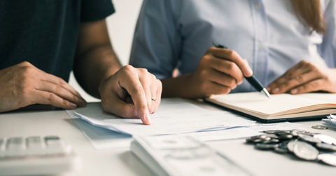 couples analyzing expenses together