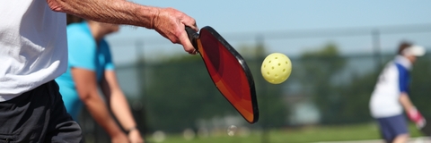 pickleball is played outdoors