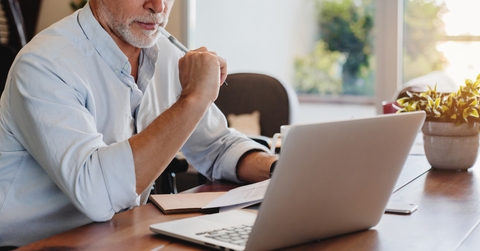 senior man using laptop 