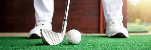 golfer preparing to hit the ball