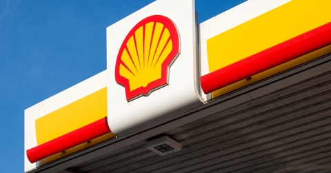 shell sign against blue sky