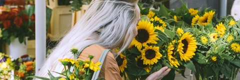 woman buying fresh flowers