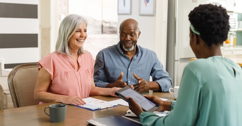 couple talking to financial advisor