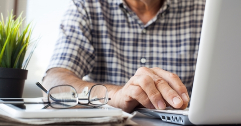Senior man working on computer