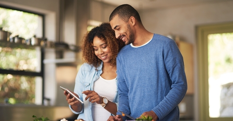 couple using a digital tablet